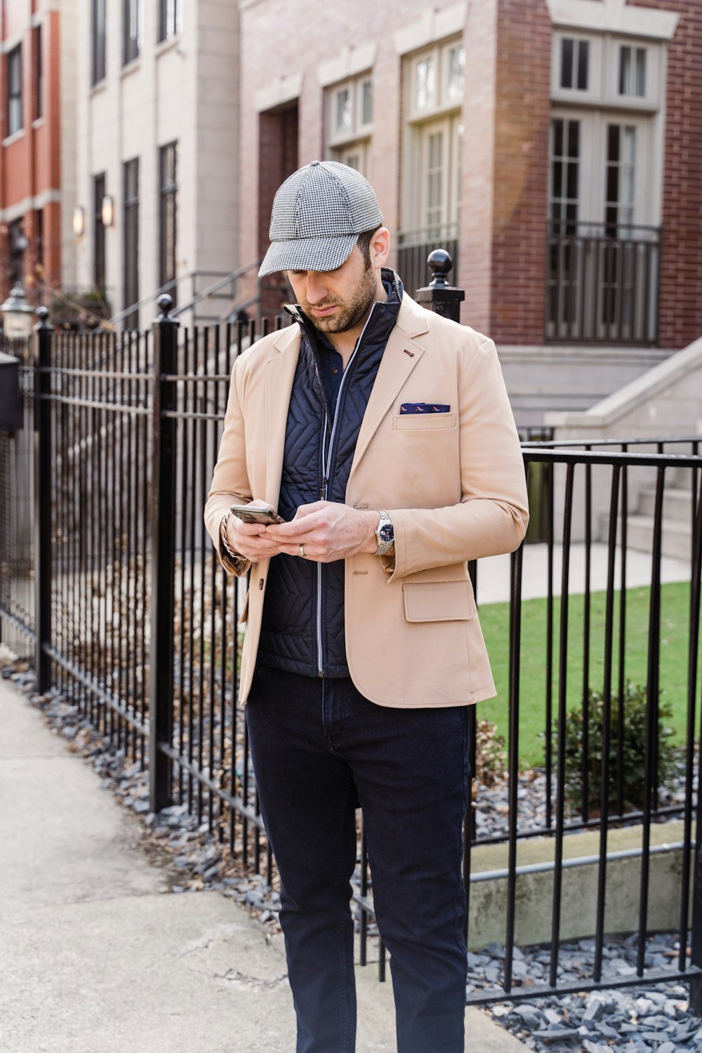 Campaign model wearing everyday cap in tailored urban setting